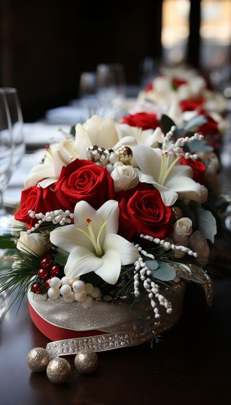 Aux Fleurs de l'Olympe à Goussainville, la magie des fêtes s'invite dans chaque création. Pour embellir vos tables et célébrer Noël dans une ambiance raffinée, découvrez nos compositions florales uniques et somptueuses. Cette année, surprenez vos invités avec des décorations de table festives qui allient la chaleur des roses rouges et la pureté des lys blancs, sublimées par des éléments brillants et des baies hivernales. Chaque détail de cette composition florale est pensé pour capturer l'esprit de Noël, ajoutant une touche d'élégance et de convivialité à votre soirée.

Notre équipe de fleuristes passionnés vous accompagne pour faire de vos fêtes un moment inoubliable. Que vous cherchiez un centre de table pour un dîner spécial, une décoration florale pour accueillir vos proches, ou simplement un bouquet festif, nous avons ce qu’il vous faut. Située dans la galerie du Carrefour de Goussainville, notre boutique vous accueille pour découvrir nos créations de Noël, prêtes à apporter une atmosphère chaleureuse et lumineuse à vos célébrations.

Laissez-vous inspirer par l’art de la composition florale de Les Fleurs de l'Olympe et trouvez le bouquet ou l'arrangement qui donnera vie à votre table. Nos créations sont réalisées avec des fleurs fraîches et de qualité, pour un Noël élégant et mémorable.